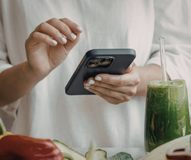 Woman logging meal on her smartphone