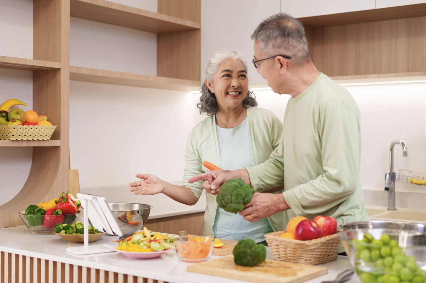 Two kūpuna cooking a brain healthy meal together