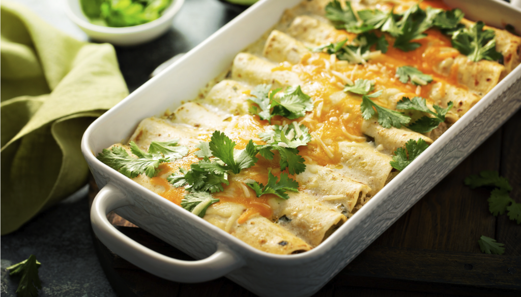 Dish containing vegetable enchiladas