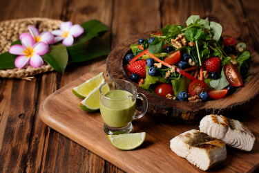 Fern and green papaya salad with watercress dressing