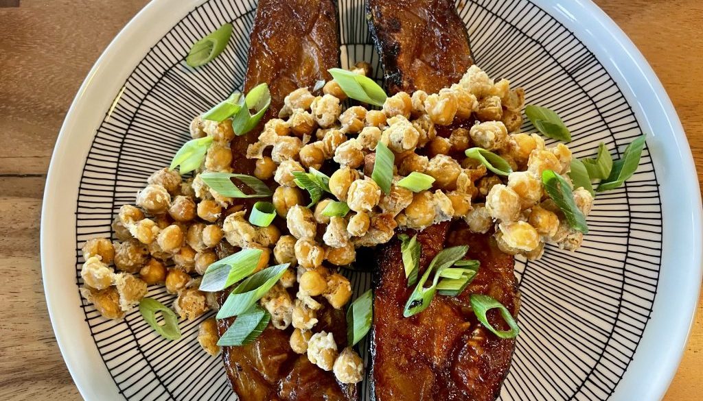 Plate of huli huli zucchini with crispy chickpeas